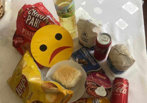 Produkty niezdrowe - emotikonka smutna buźka