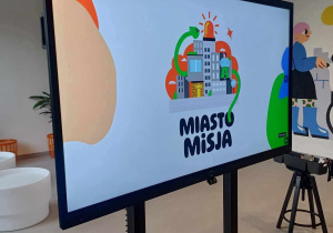 Przy banerze reklamowym