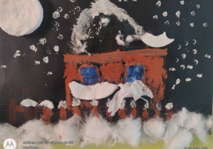 Na czarnym tle - ośnieżony dom